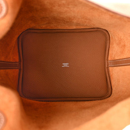 Tan leather interior pocket with HERMÈS logo patch