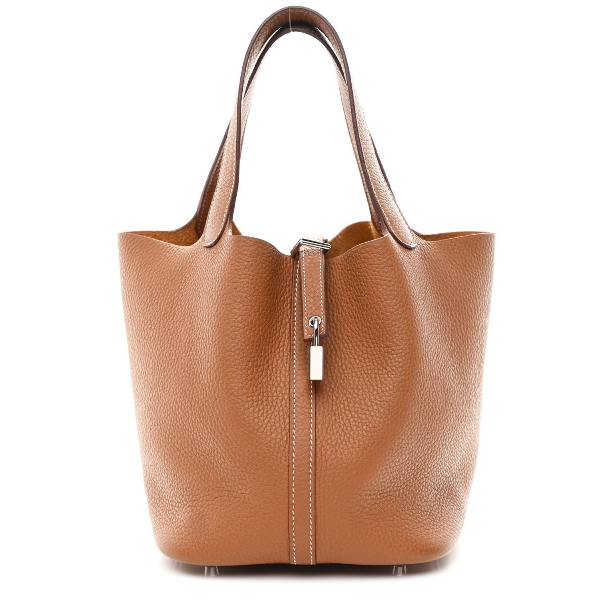 Tan leather tote bag with top handles and front lock zipper pull