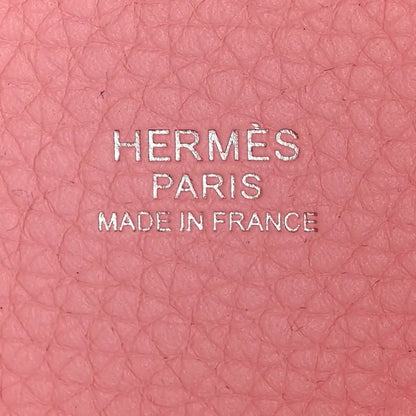 Rose leather with HERMES PARIS MADE IN FRANCE text in center
