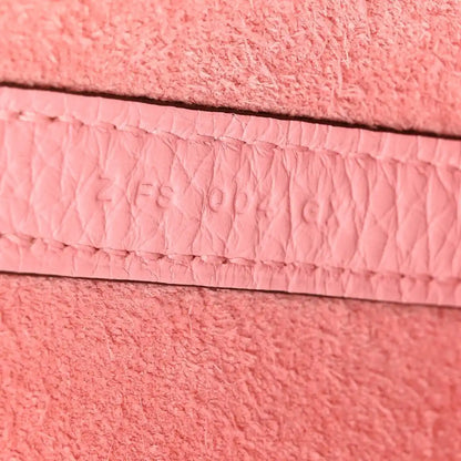 Rose leather edge with stitched trim and recessed embossing detail