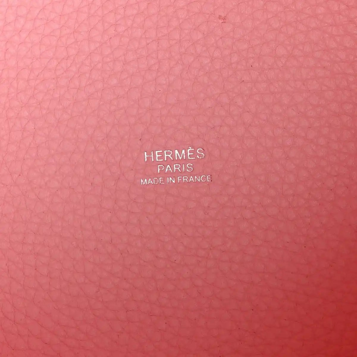 Rose leather stamp reading HERMES PARIS and MADE IN FRANCE