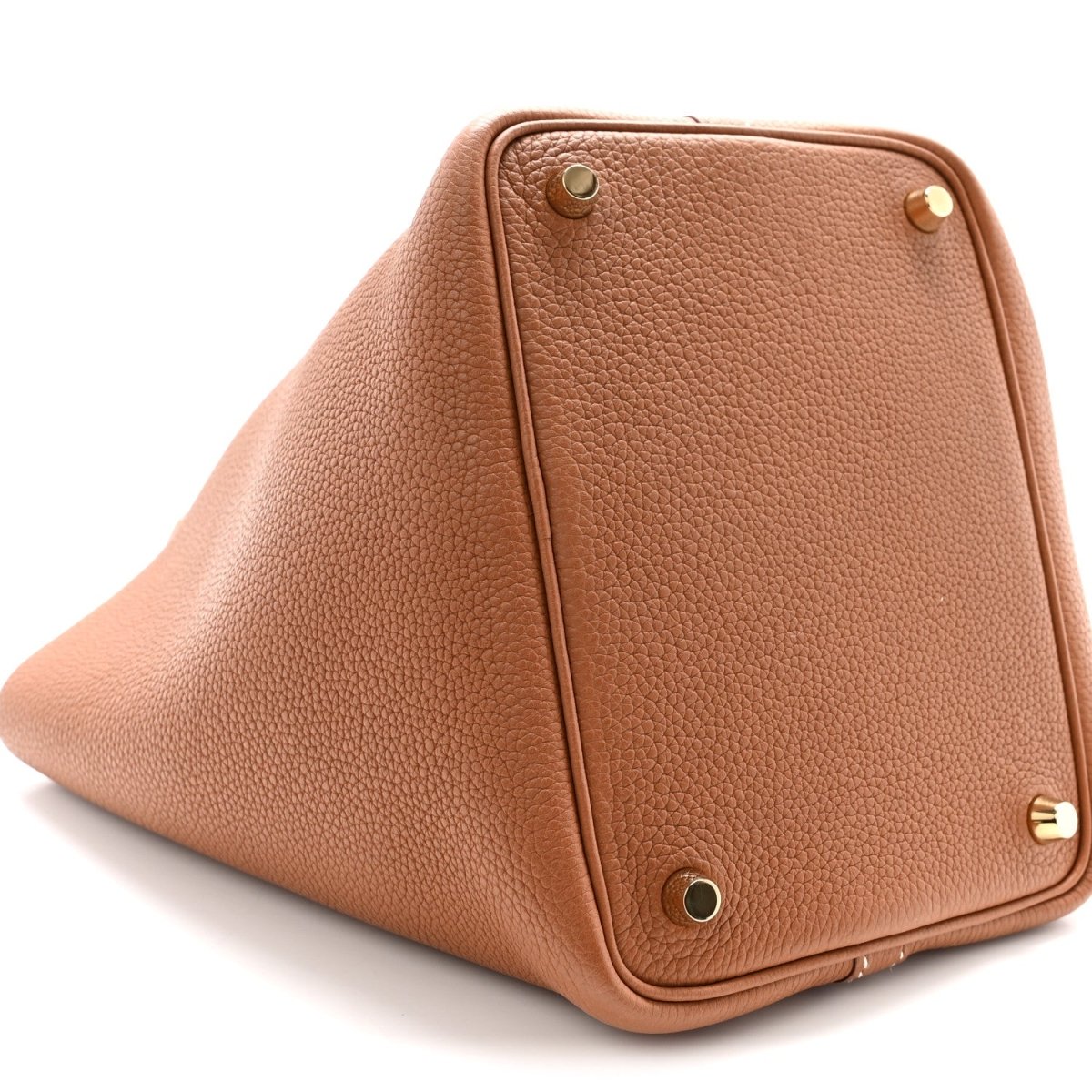 Tan leather Picotin-style handbag side view with gold hardware and corner snaps