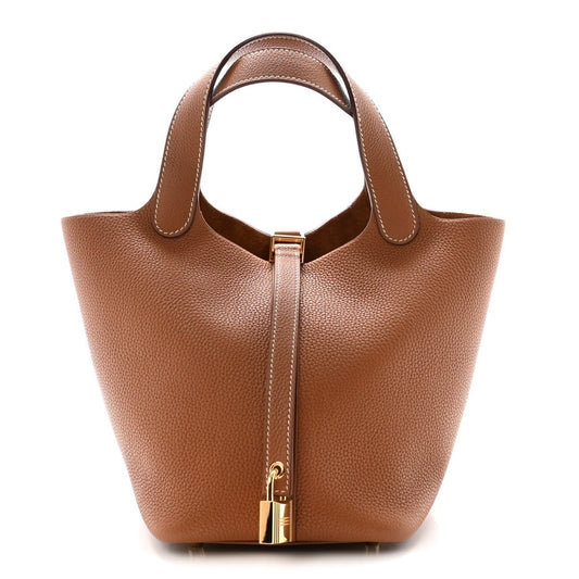 Brown leather Picotin-style handbag with top handles and gold lock hardware