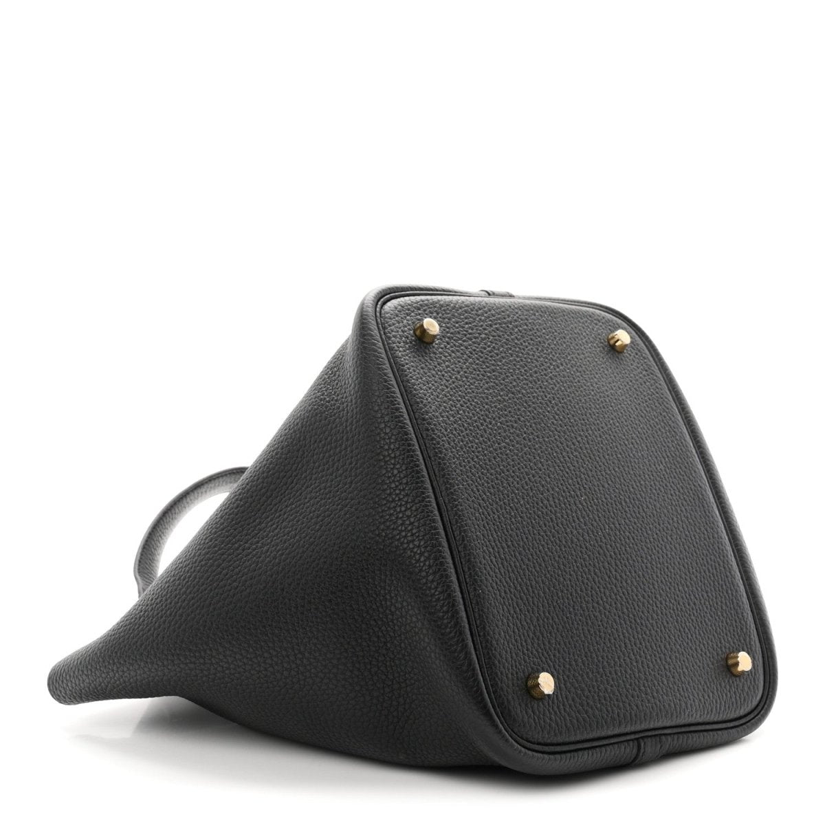 Black leather tote with gold-tone studs and triangular profile on angled view.