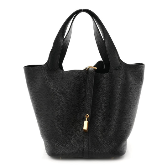 Black leather tote bag with two handles and central gold-tone lock detail.