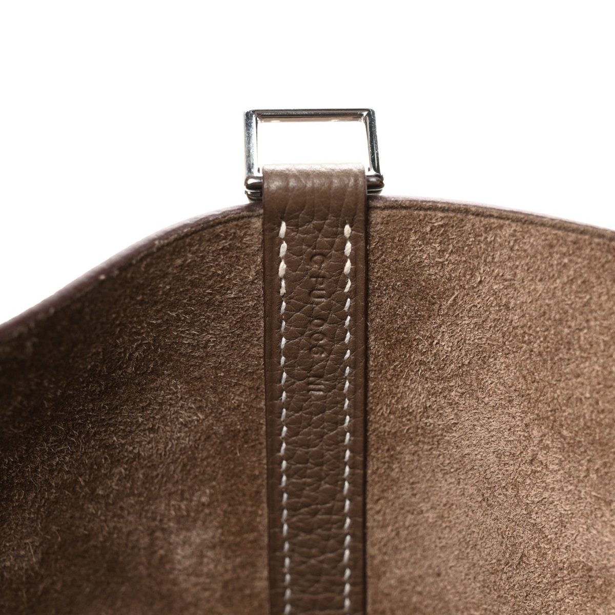 Leather Picotin bag strap loop in brown with contrast stitching and metal ring