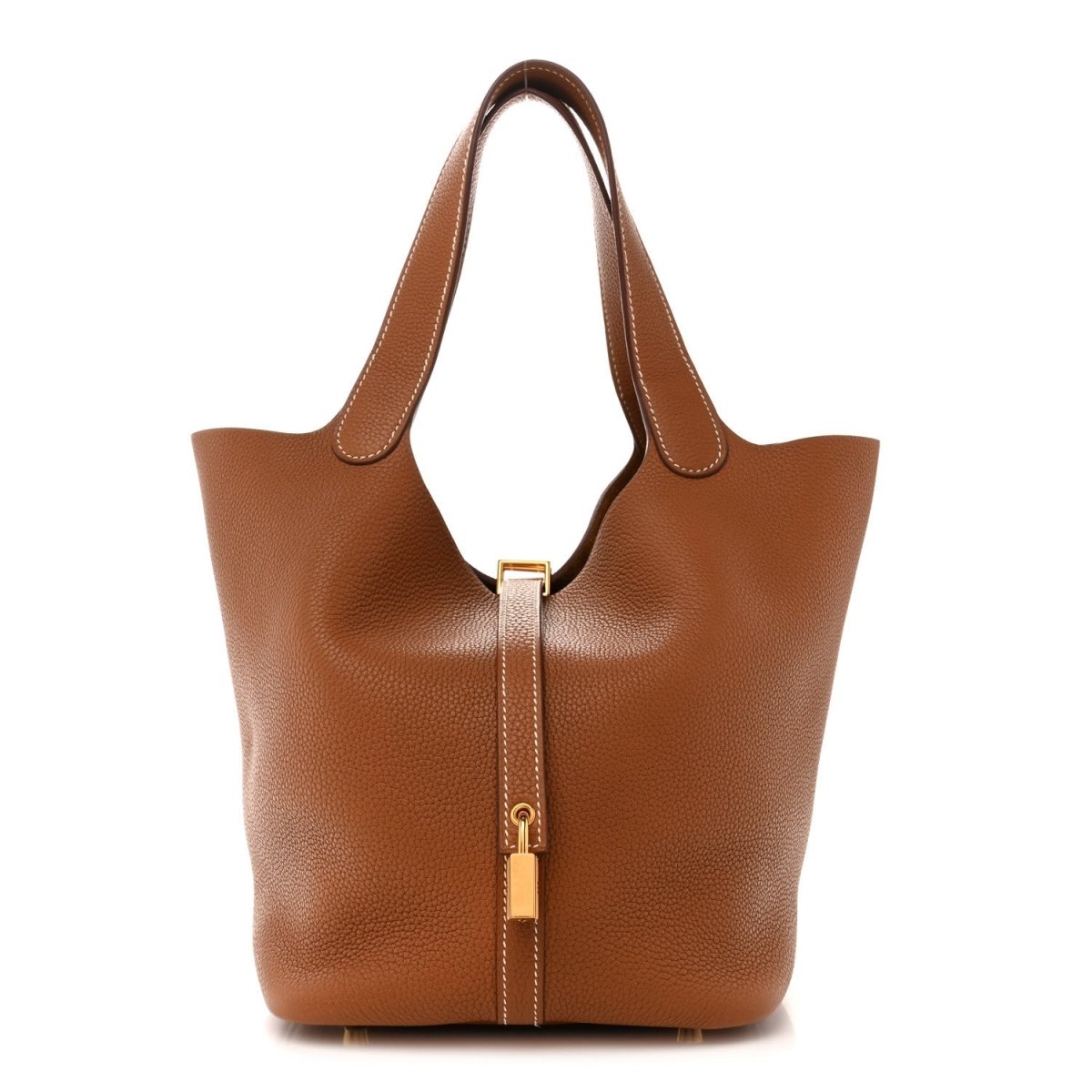 Tan leather tote bag with two rolled handles and gold lock front closure