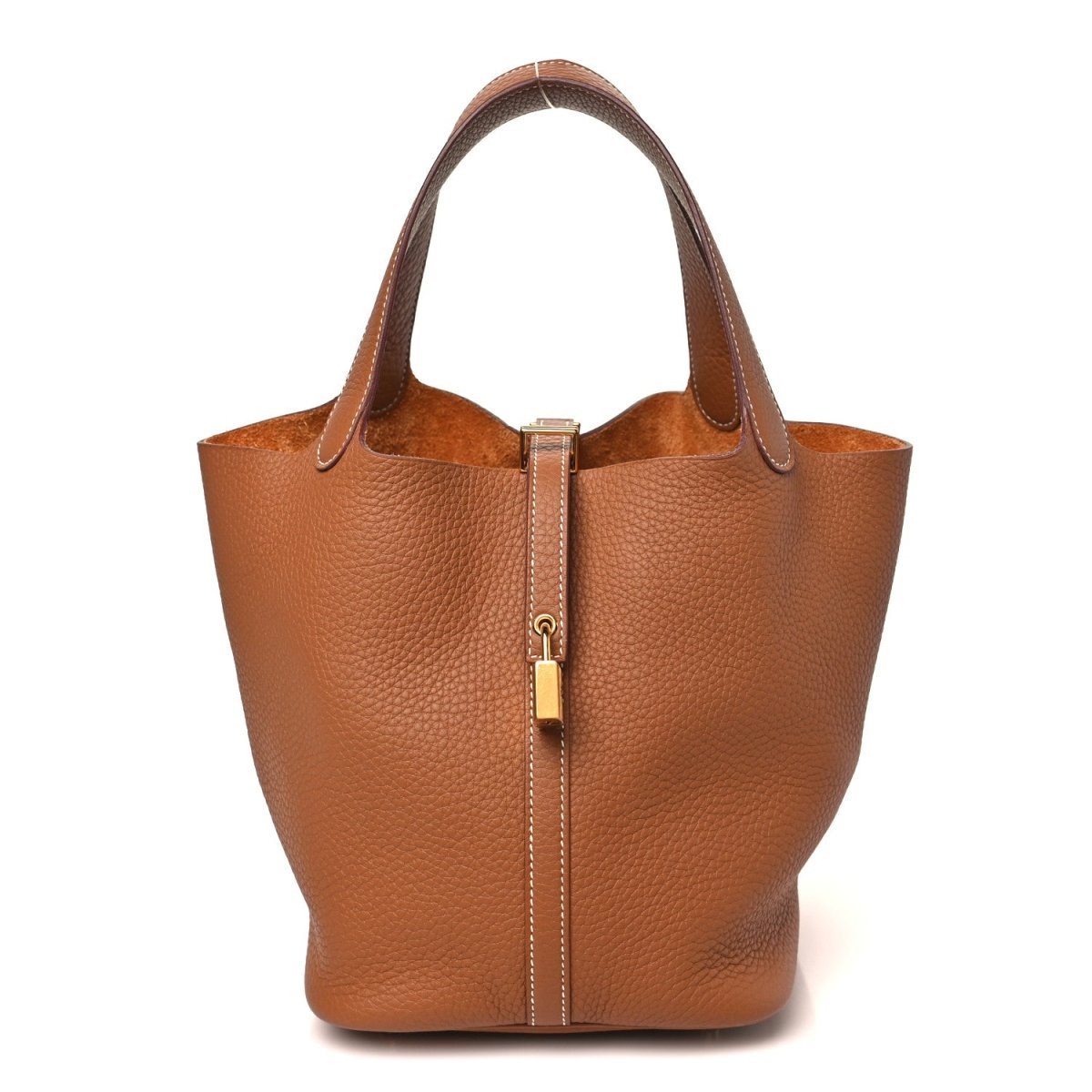 Leather tote bag with gold lock, top handles, textured finish in tan/brown.