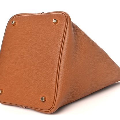Tan leather Picotin Lock tote with gold-tone rivets