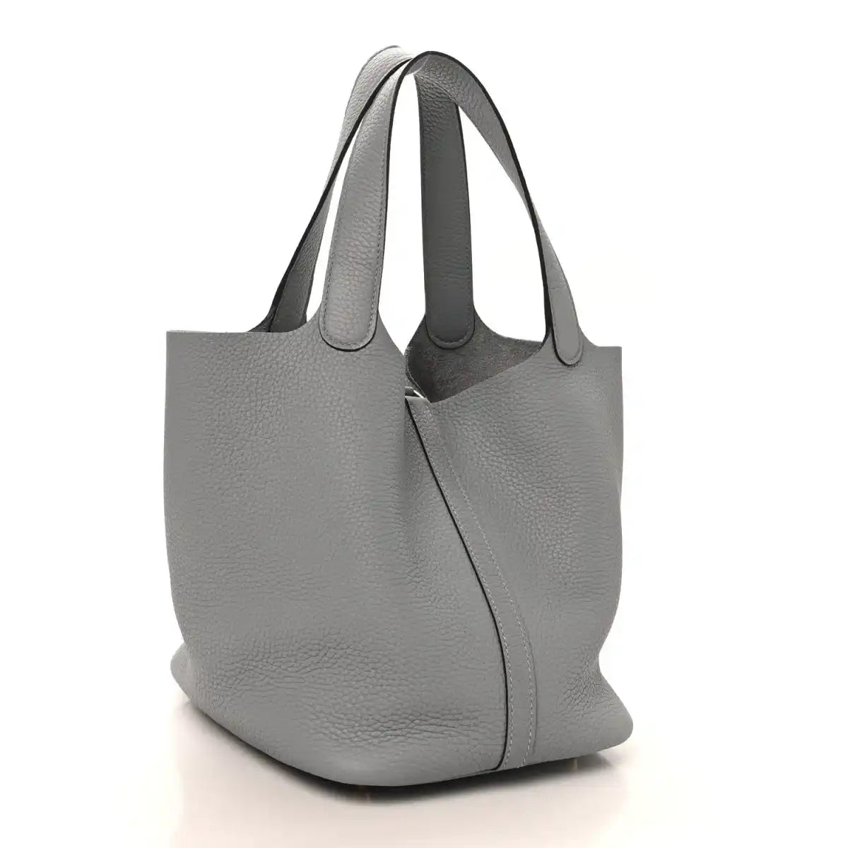 Grey leather tote bag with an adjustable strap and gold clasp lock