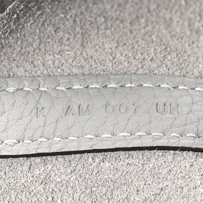 Light grey leather serial stamp on stitched edge