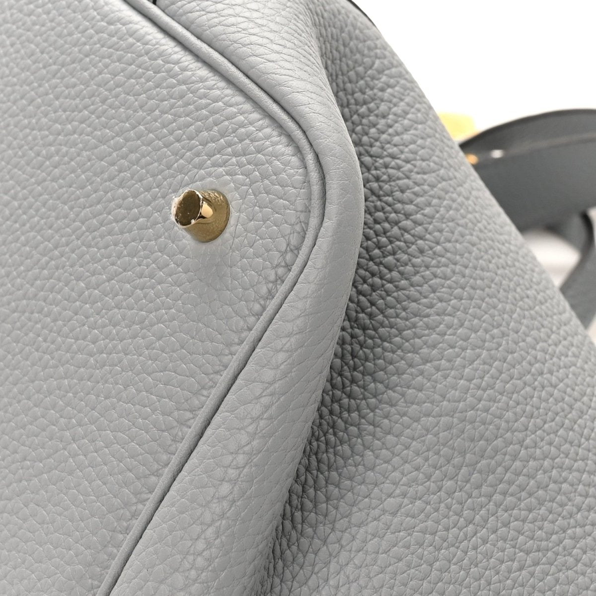 Light gray pebbled leather Picotin lock bag, gold clasp with curved flap seam