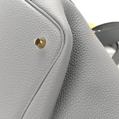 Light gray pebbled leather Picotin lock bag, gold clasp with curved flap seam