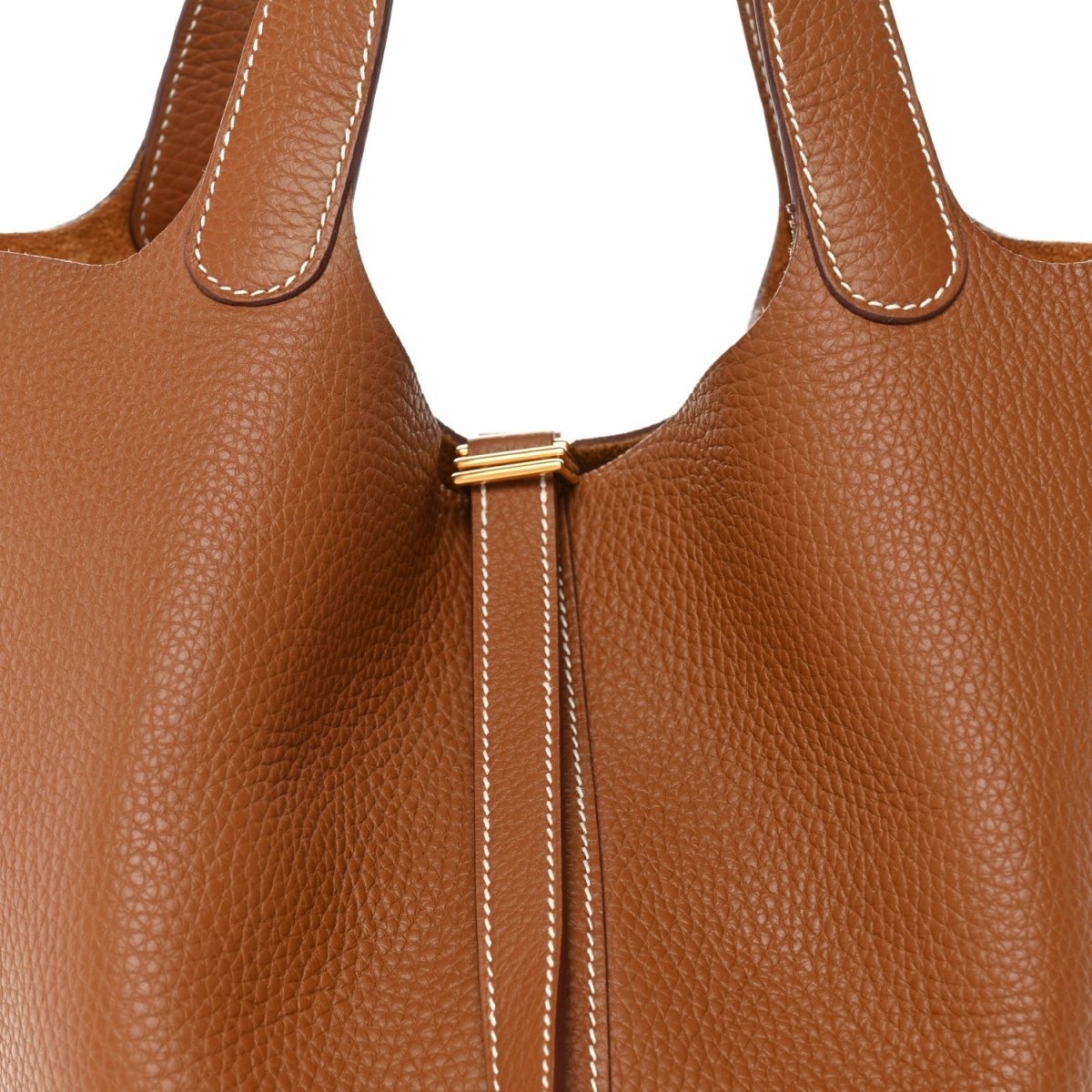 Tan leather bucket bag top with gold-tone lock and double drawstring ties