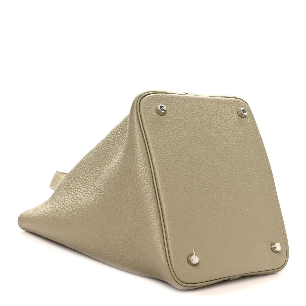 Sauge leather handbag with corner rivets and structured trapezoid shape