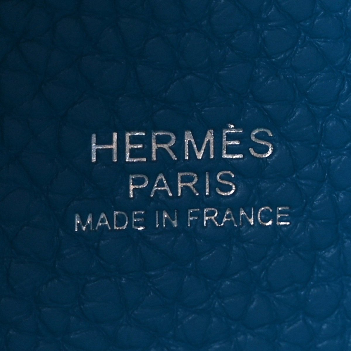 Blue leather stamp reading HERMES PARIS and MADE IN FRANCE