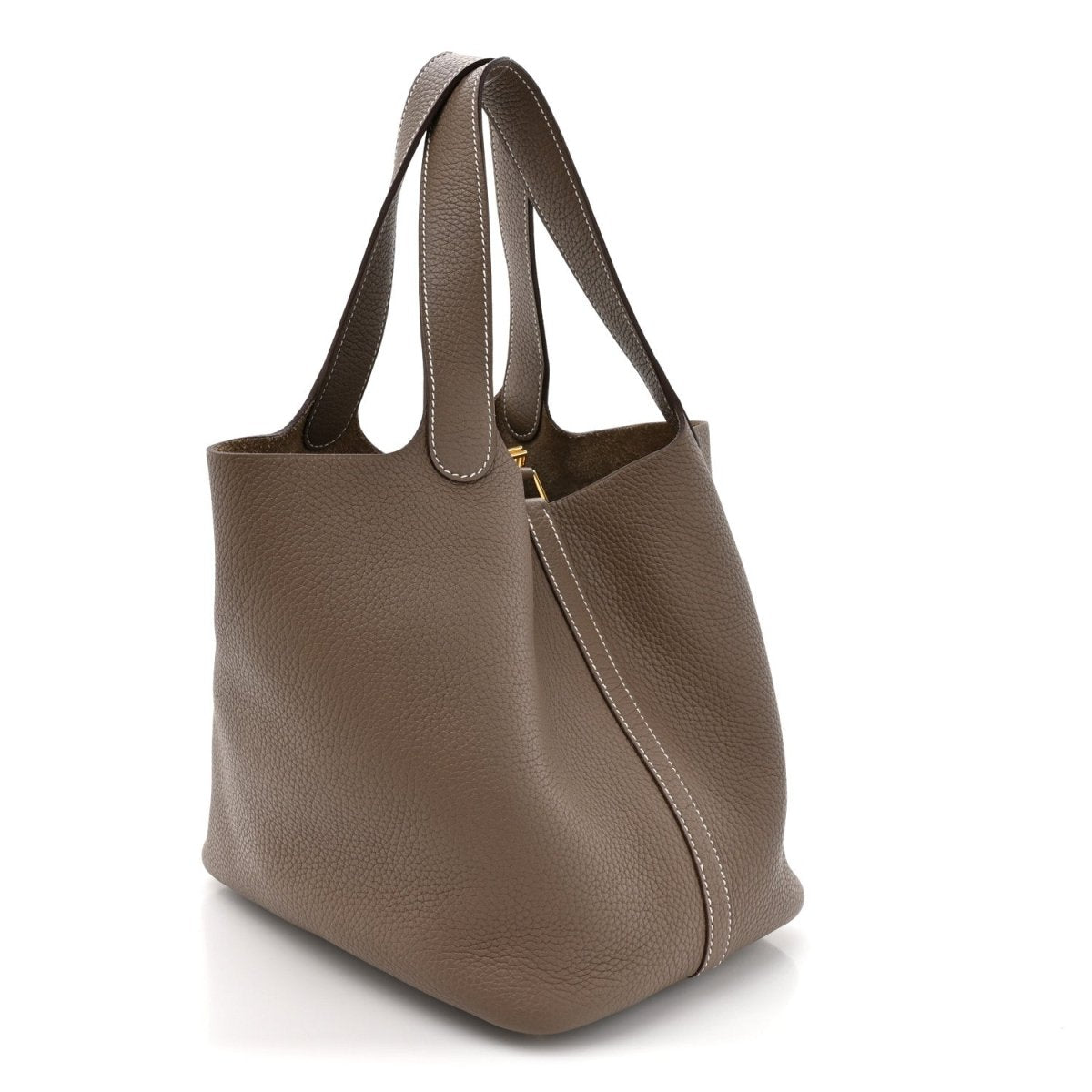 Taupe leather tote bag with wide handles and gold lock zipper