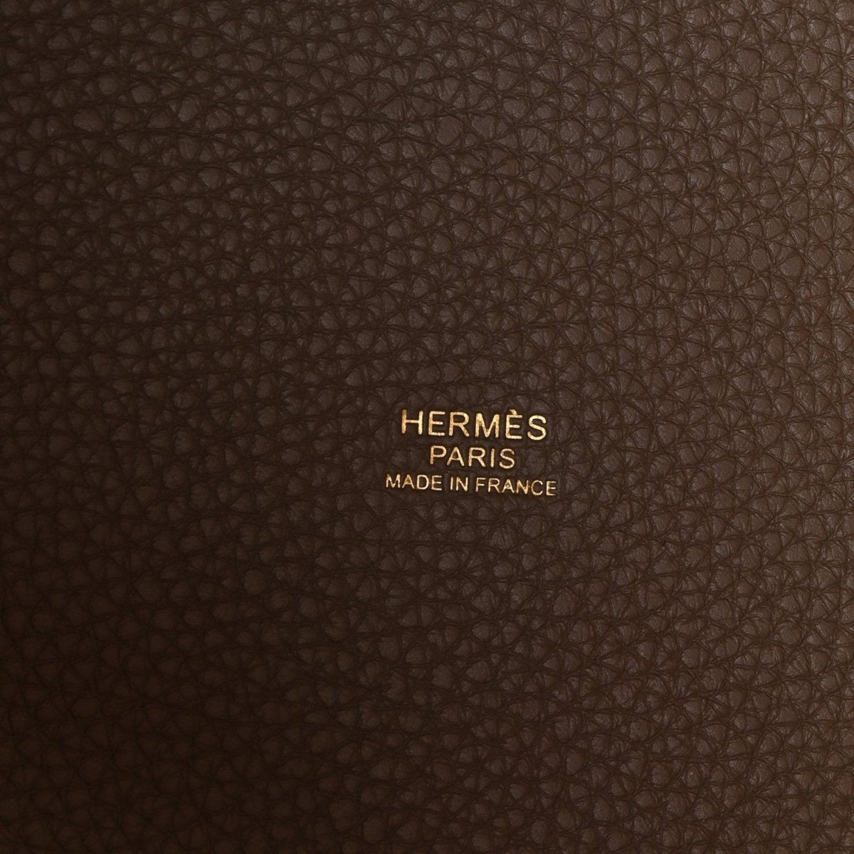 Taupe leather lining with Hermes Paris Made in France text