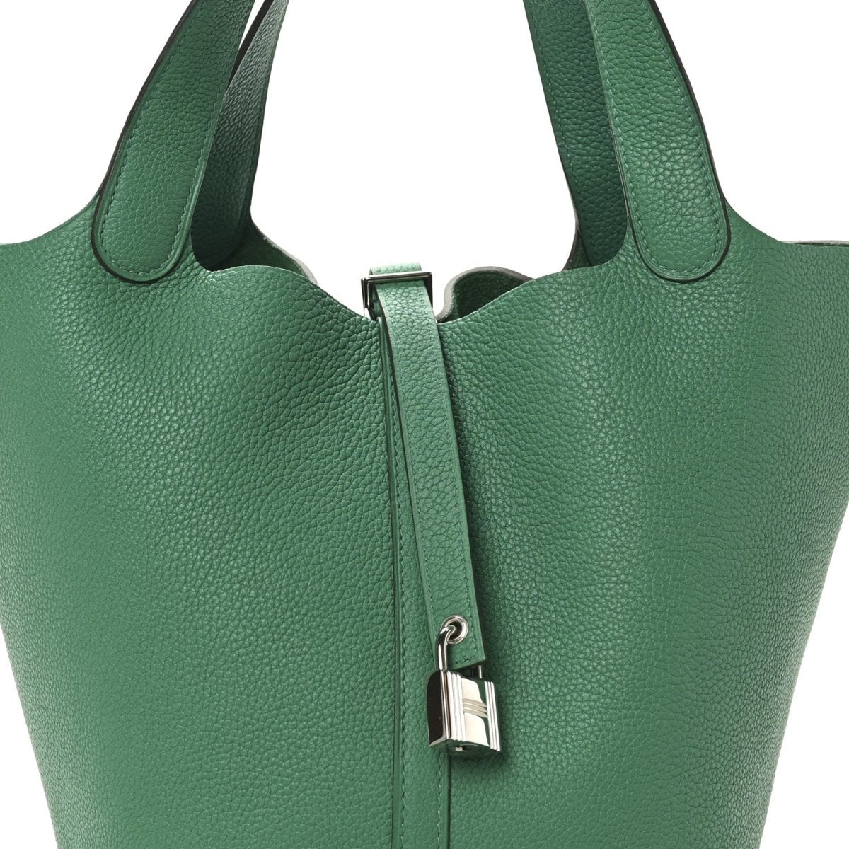 Green leather tote bag front with top handles and center zip lock