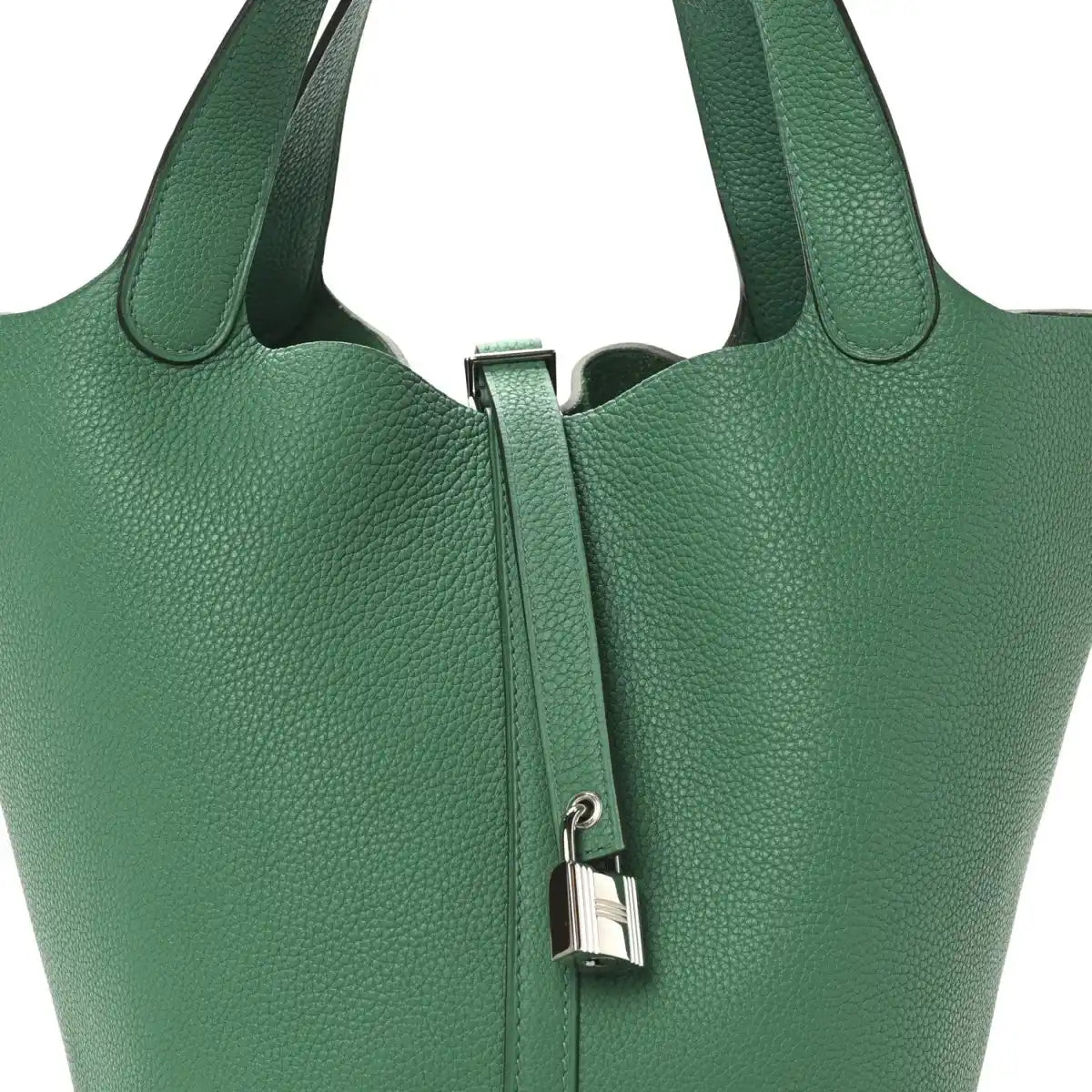 Green leather tote bag front with top handles and center zip lock