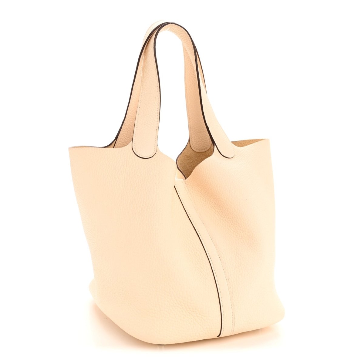 Light beige leather bucket bag with top handles and side seam detailing