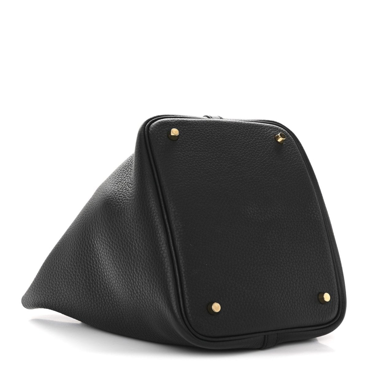 Black leather tote bag with gold-tone snap studs and angled front panel.
