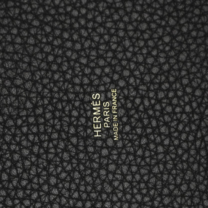Black leather with Hermès Paris branding logo stamp.