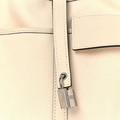 Cream tote bag lock clasp and strap with metal hardware