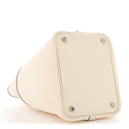 Nata tote bag side panel with metal feet and leather trim